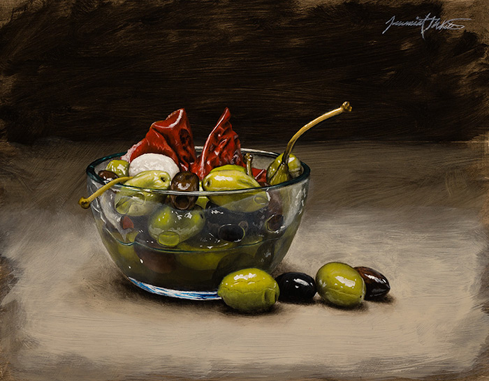 A still life painting of an olive medley in a glass bowl.